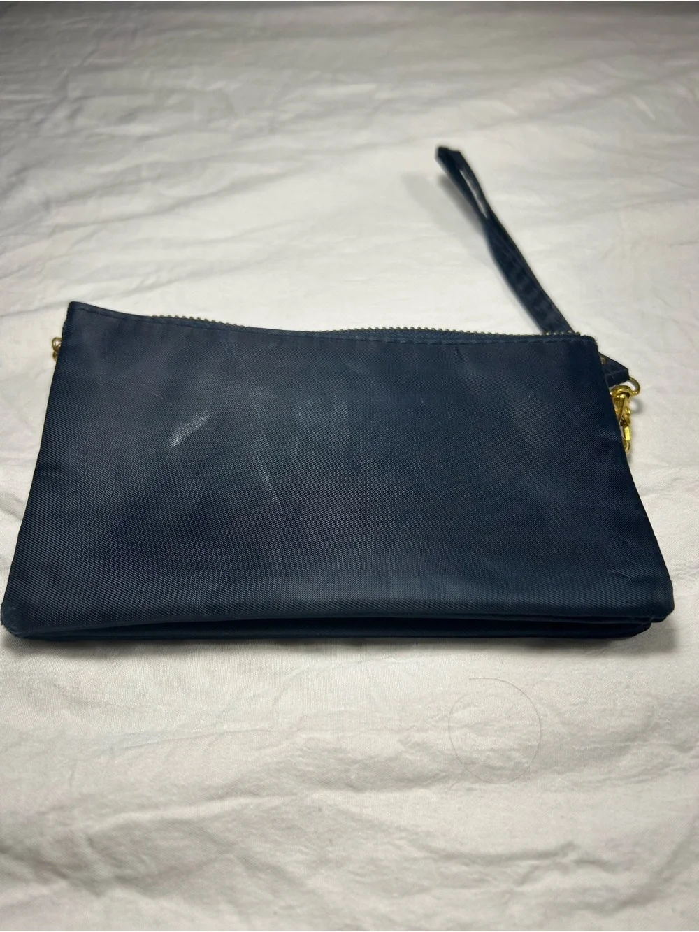 Tory Burch Navy Wristlet with Gold Emblem